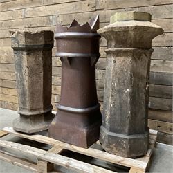 Collection of three Victorian and early 20th century reclaimed terracotta chimney pots, comprising: one cylindrical form with weathered, cracked glaze and flared octagonal base; one deep red cylindrical pot with fluted midsection and castellated rim, bearing moulded number ‘25’; and one tapering hexagonal example with wide flared rim and weathered patina. All with age-related wear and chips, consistent with use and outdoor exposure. Plus a selection of cast stone pieces including fountain 