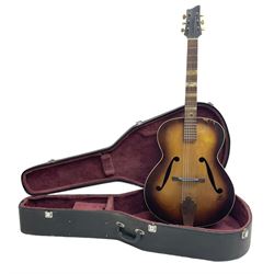 1950s Framus arch top acoustic guitar with sunburst finish and Framus logo to top, No.1937 L104cm; in hard carry case.