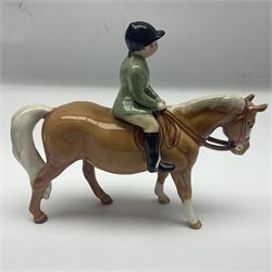 Beswick Boy on Palomino Pony no 1500 and Girl on Skewbald Pony no 1499, both with printed mark beneath 