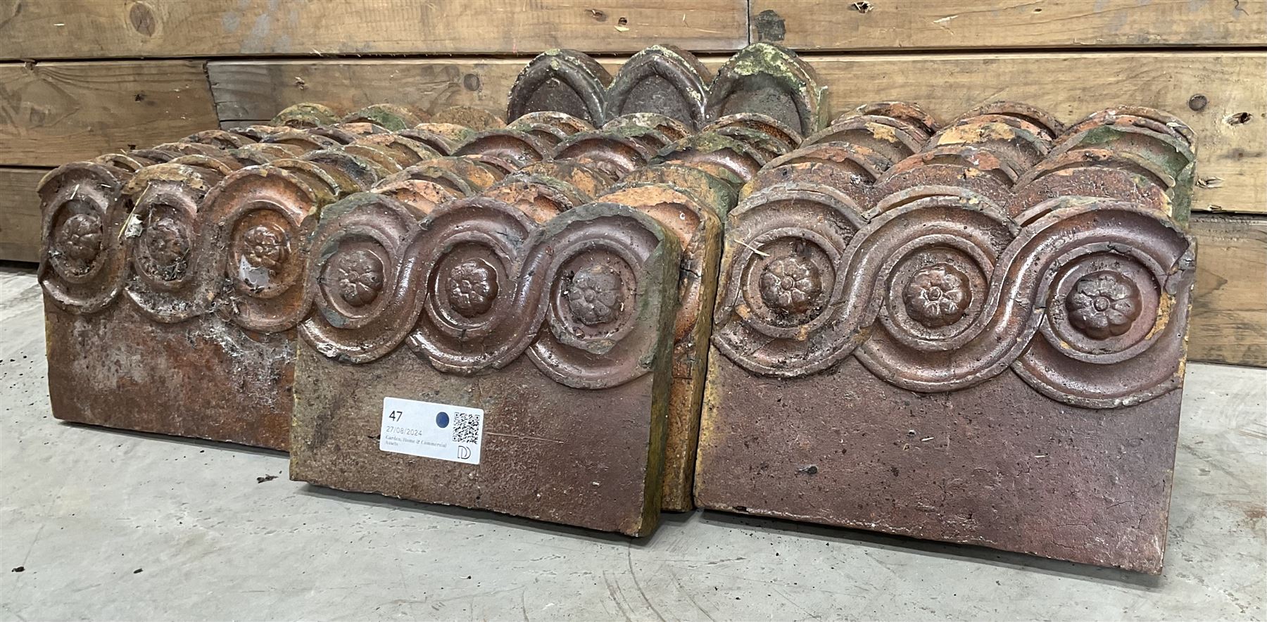 Twenty six Victorian terracotta edging tiles