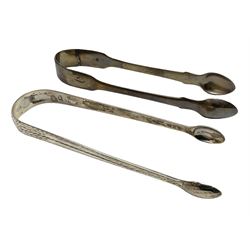 Two pairs of Georgian silver sugar tongs, to include a bright cut decorated example, approximate total silver weight 2.02 ozt (62.8 grams)