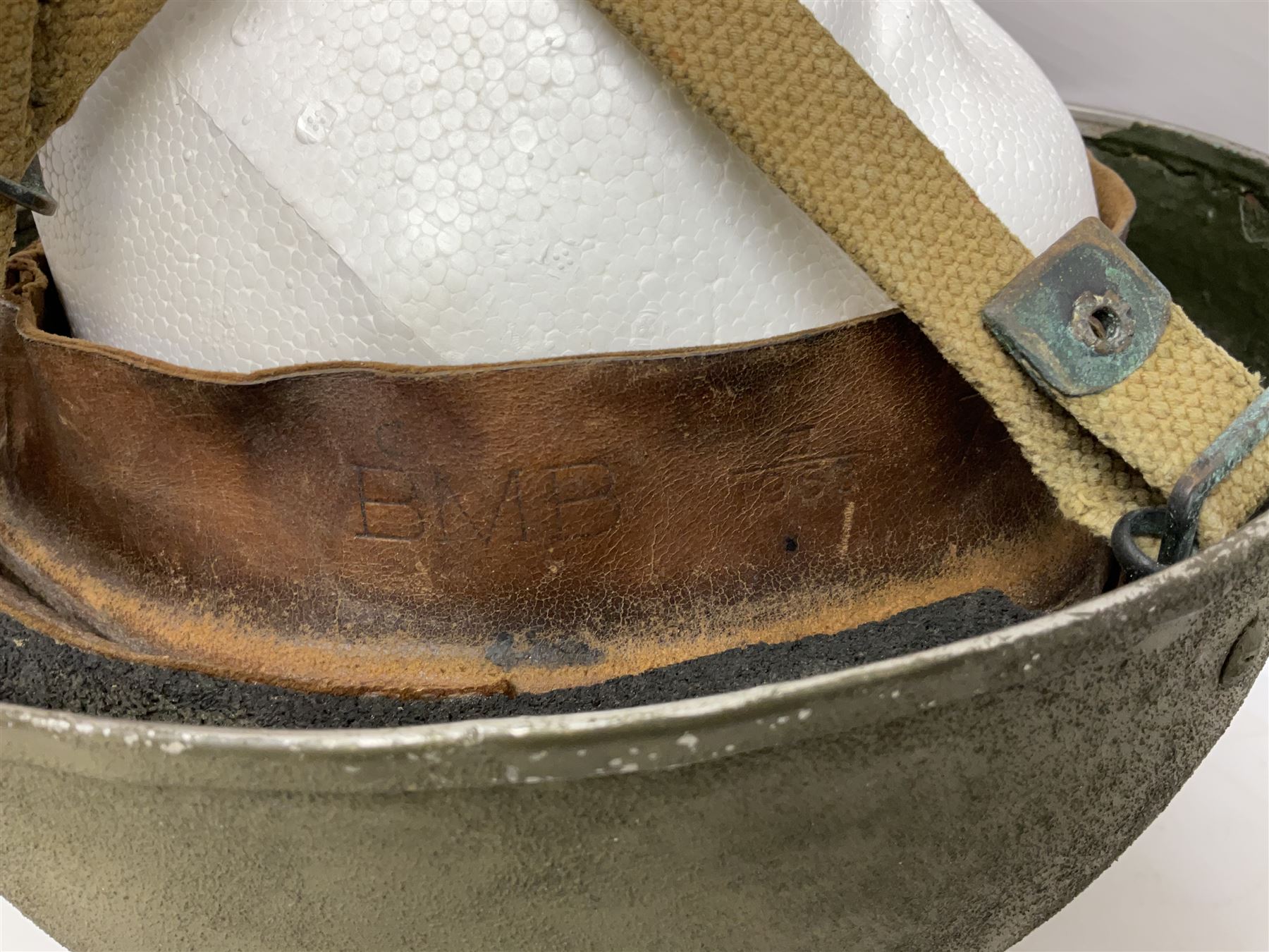 Post-WW2 British Airborne Troops,/Paratroopers Steel Helmet with green textured paint finish, leather and sponge liner and three point chinstrap mounting; liner marked BMB II 1953 71/4