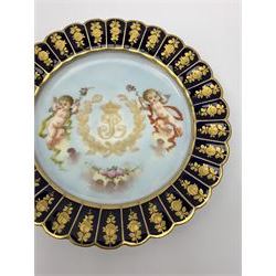 Mid 19th century Sevres Louis Philippe period porcelain cabinet plate, decorated with central Louis Philippe crowned monogram flanked by two cherubs, within cobalt gilt detailed border, with date mark for 1846, red inventory mark for Chateau des Tuileries, and blue monogram mark , D14.5cm