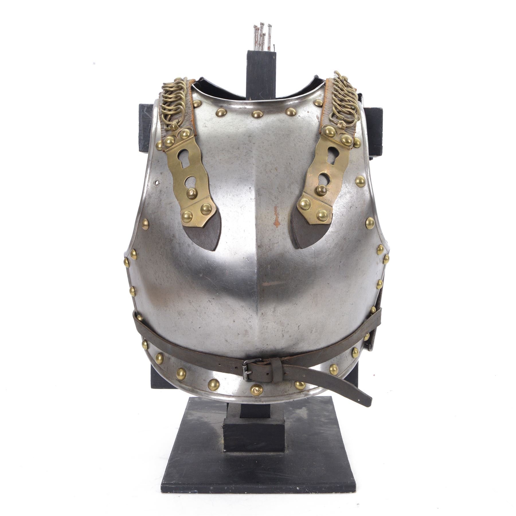 Napoleonic Belgium Cuirassier breast and back plate, circa 1814, with raised medial ridge and shallow apron, rolled edge and brass studded decoration, the shoulder chains secured by chest studs, H40cm