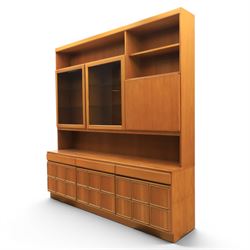 Mid-20th century teak wall display unit, featuring two glazed cupboards and fall front com...