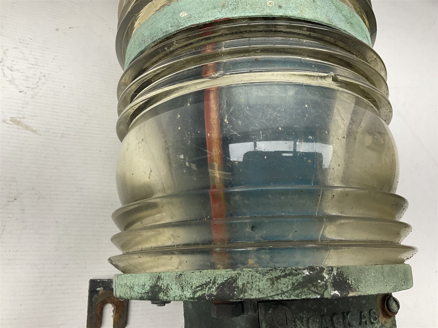 Two port and starboard brass lamps, each with a plaque marked 'Noack as Lanterne KL.A Serie 700 Type 704D Babord', ribbed green and red glass shades, H44cm