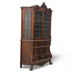 Late 19th century Continental bombe cabinet on chest, shaped moulded cornice with carved c...