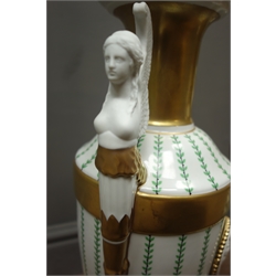  Pair Italian porcelain table lamps by Giulia Mangani, of Neo-classical urn form, winged female mask handles, painted with bands of trailing leafage, with applied oval plaque relief moulded with a female bust within a gilt beaded border on square gilt marble style base with cast metal plinth and cream pleated shades, H86cm overall  