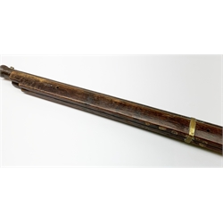 Late 19th/early 20th century ornamental oriental matchlock musket, the hardwood stock with row of oriental characters, 72cm steel barrel undrilled at action, brass fittings and ramrod aperture L111cm