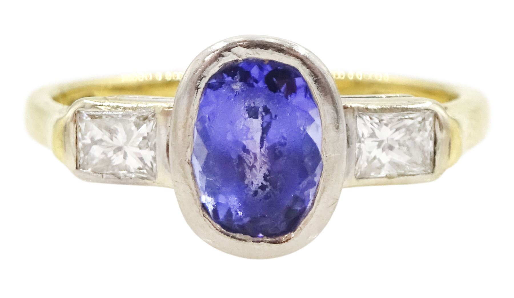 18ct gold three stone oval cut tanzanite and radiant cut diamond ring, hallmarked, tanzanite approx 1.10 carat, total diamond weight approx 0.40 carat