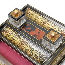 Mid 19th century Boulle inkstand in cut brass and tortoiseshell with beaded decoration with two pen trays and two inkwells on a single drawer base and compressed bun feet W32cm 
