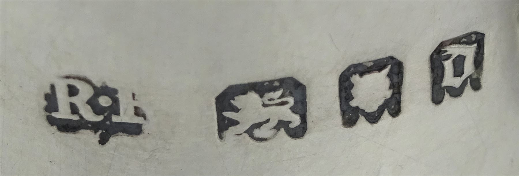 Silver milk jug and sugar bowl by Robert Pringle & Sons, London 1919 and a silver sauce boat by Sheffield Harrison Brothers & Howson, Sheffield 1904, approx 7.7oz