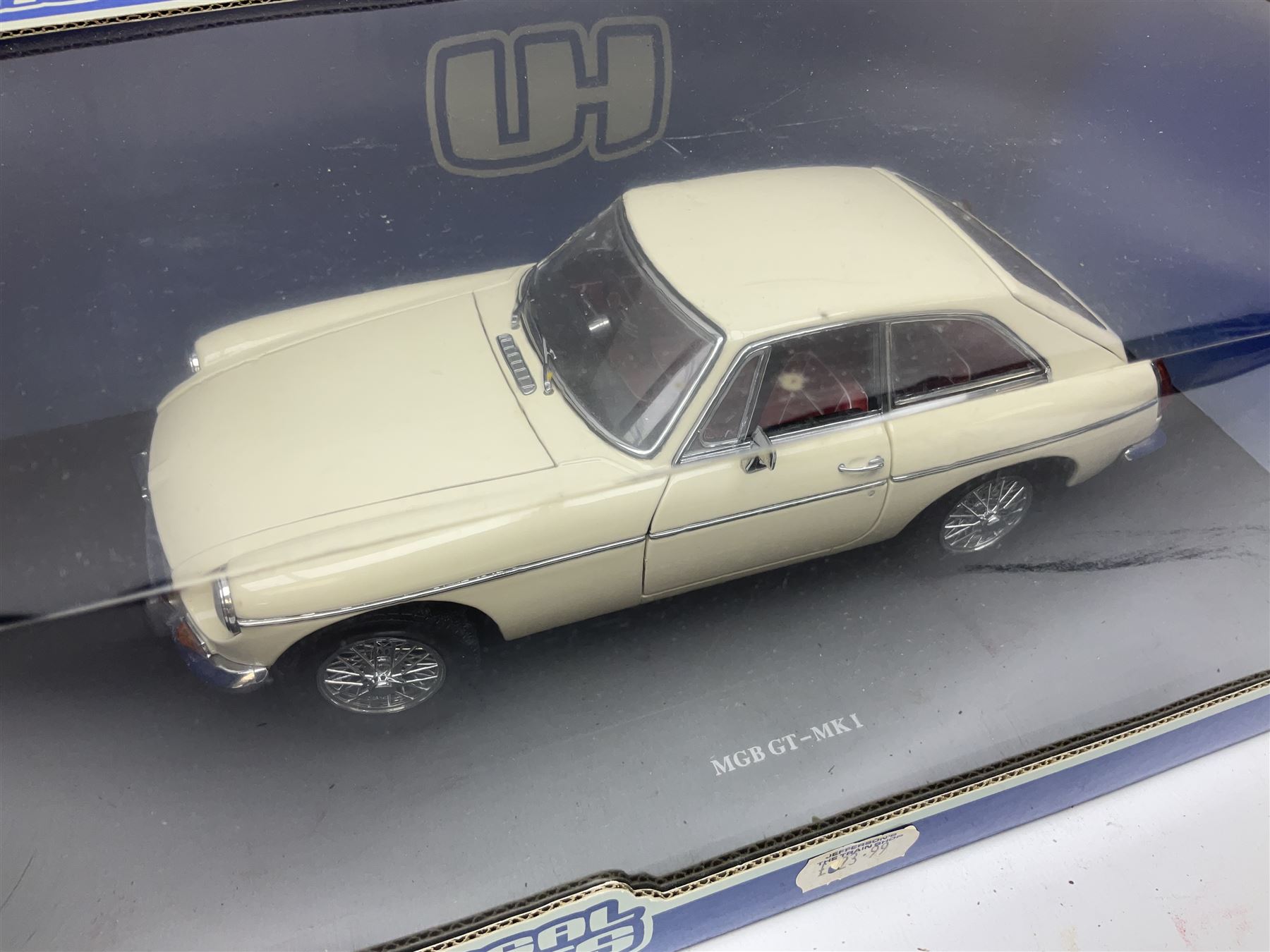 Six 1:18 scale die-cast models - Road Legends Chevrolet Nomad (1957) and Ford Fairlane Crown Victoria (1955); Universal Hobbies MGB-GT Mk.1 4-cylinder Old English White and Land Rover Serie III Police Patrol; Road Tough Shelby Cobra 427S/C (1964); and Mira 1955 Buick Century; all boxed (6)