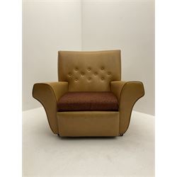 Retro armchair, buttoned tan leather upholstery, raised on castors 