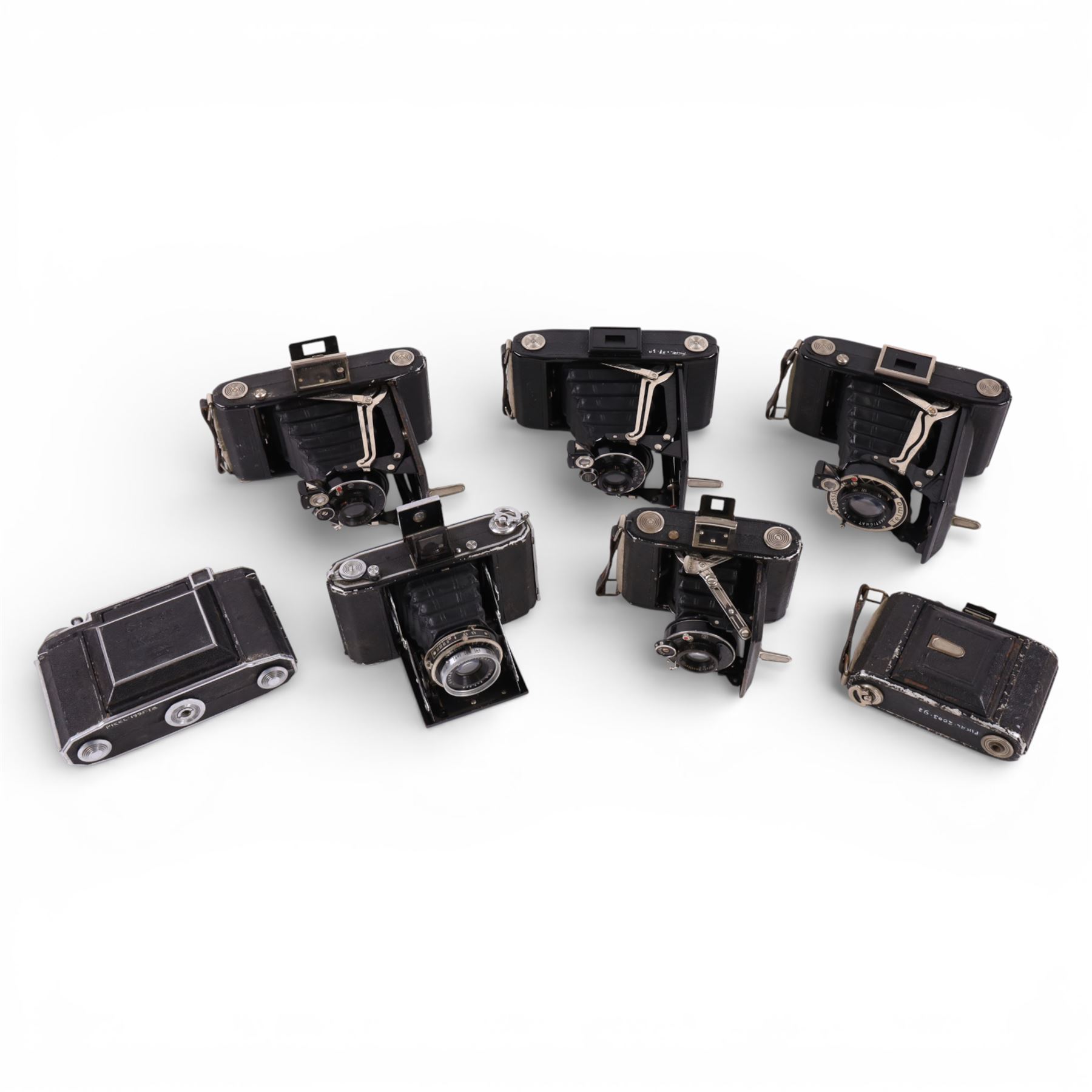 Collection of Zeiss Ikon folding cameras, including Telma, Ikonta and Super Ikonta models