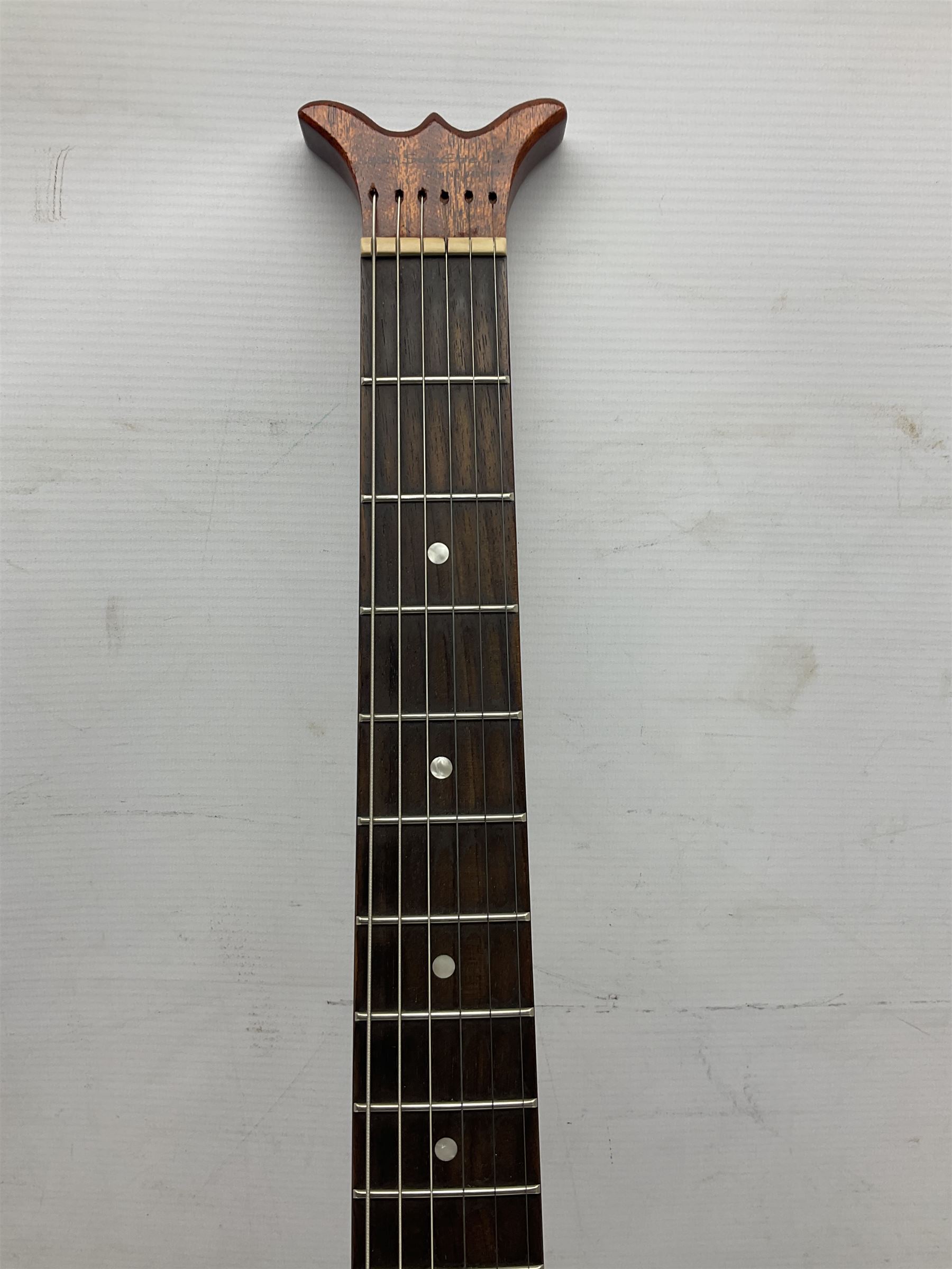 Aria Sinsonido mahogany electric travel guitar, serial no.0502385 L86cm; in original gig bag with earphones and GM11 Minituner; together with Fender Sidekick Reverb 25 amplifier and Marshall MG Series 15DFX amplifier (3)