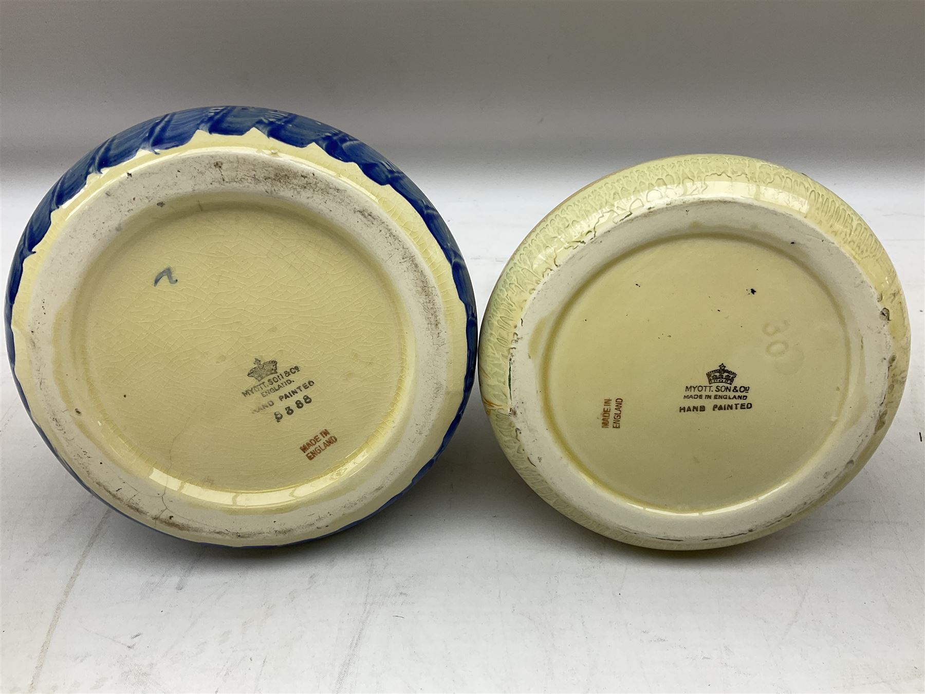 Seven Myott Son & Co hand painted jugs, all with printed mark beneath, H21cm