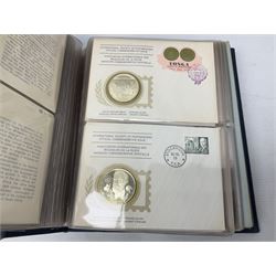 Thirty-six 'International Society of Postmasters Official Commemorative Issues' sterling silver proof medallic covers dating from 1975 to1977, housed in the official folder