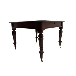 Late Victorian mahogany extending dining table, with additional leaf, raised on turned supports with brass cup and ceramic castors
