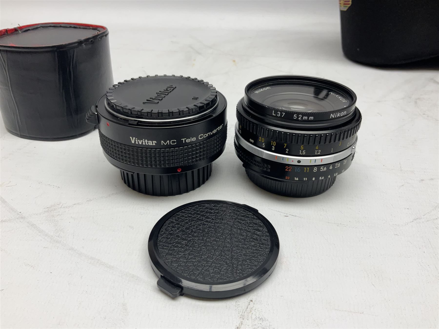 Nikon F3 SLR camera, serial number 1583609; Nikon 50mm 1:1.8 lens; Nikon 28-85mm 1:3.5-4.5 zoom lens; Vivitar MC 2X-3 Tele Converter, and a Nikon Speedlight SB-16 flash