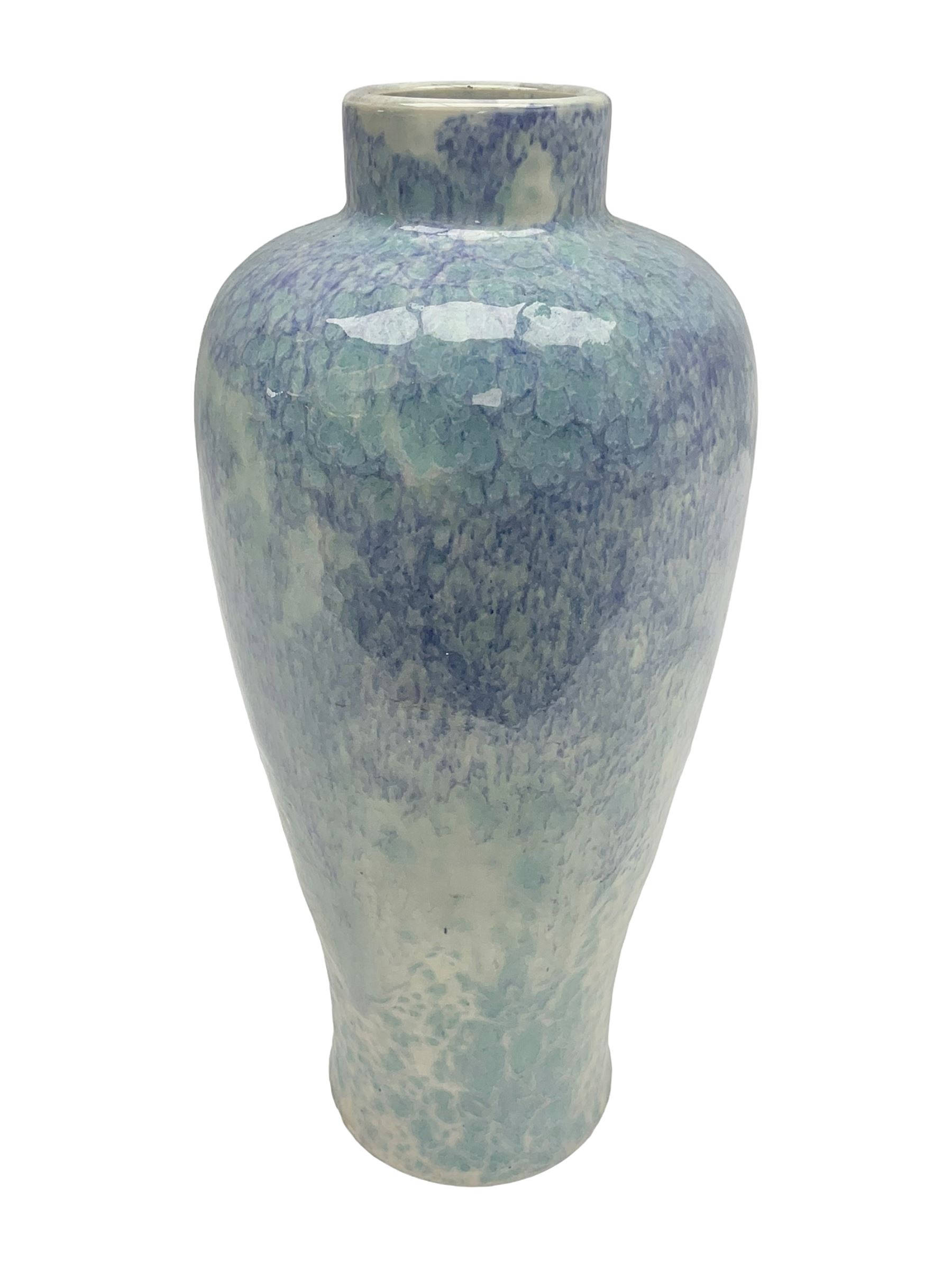 Holyrood Pottery vase of bulbous form decorated in a mottled and streaked green and blue glaze, with printed mark beneath, H24cm