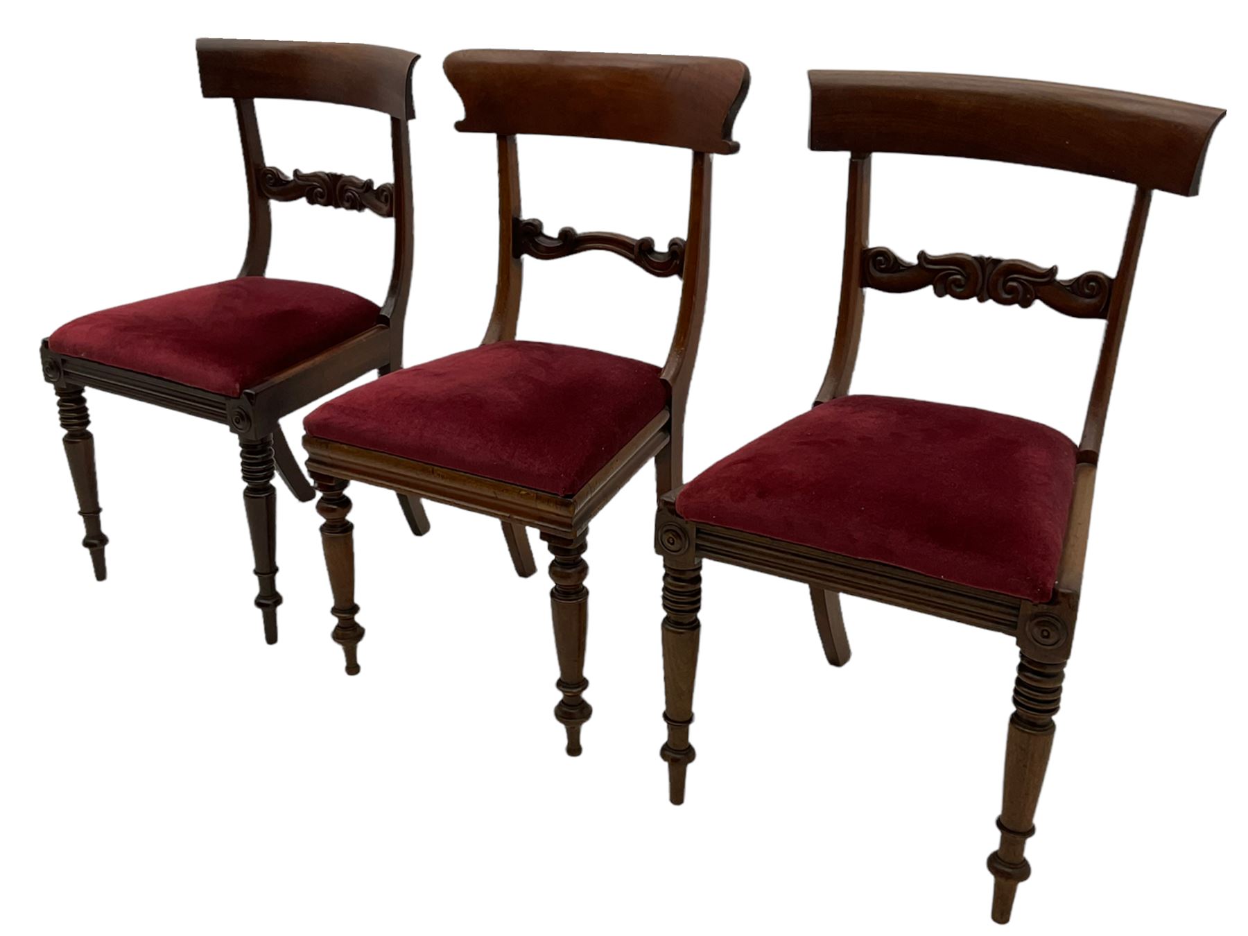 Seven early 19th century mahogany dining chairs - set six side chairs with scroll carved middle rails (W46cm), and a carver elbow chair with rope twist middle rail