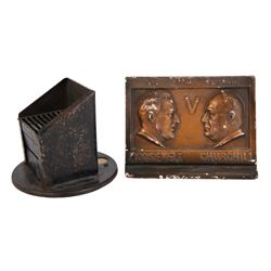 British Home front; blackout light cover, together with a wartime deco plaster plaque Roos...