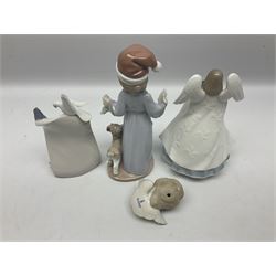 Three Lladro figures, comprising Dear Santa no 6166, Angelic Melody 1993 no 5963 and Seraphs Head no2 no 4885, together with Lladro plaque Love Brings Us Together no 7677, all with original boxes, largest example H18cm