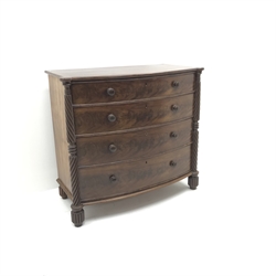  Regency figured mahogany bow front chest, four graduating drawers, turned supports, W112cm, H103cm, D57cm  