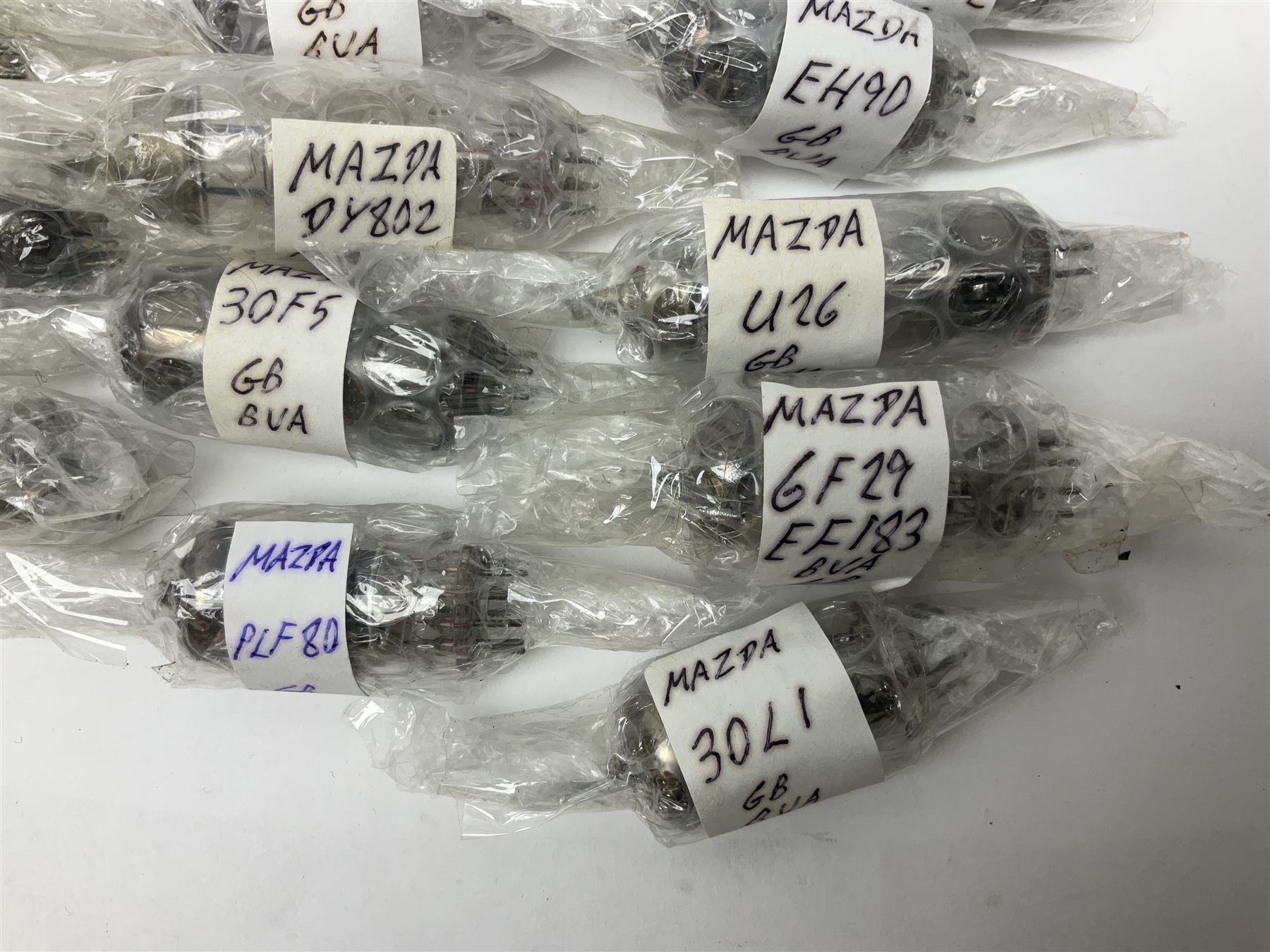Collection of Mazda thermionic radio valves/vacuum tubes, including EH90, U26, PCF84, U26 approximately 55