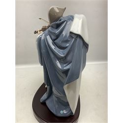 Lladro figure, Jester Serenade, modelled as a ballerina with bouquet of flowers seated before a jester playing the violin, limited edition 2541/3000, sculpted by Antonio Ramos, no 5932, with original box, year issued 1993, year retired 1994, H37cm
