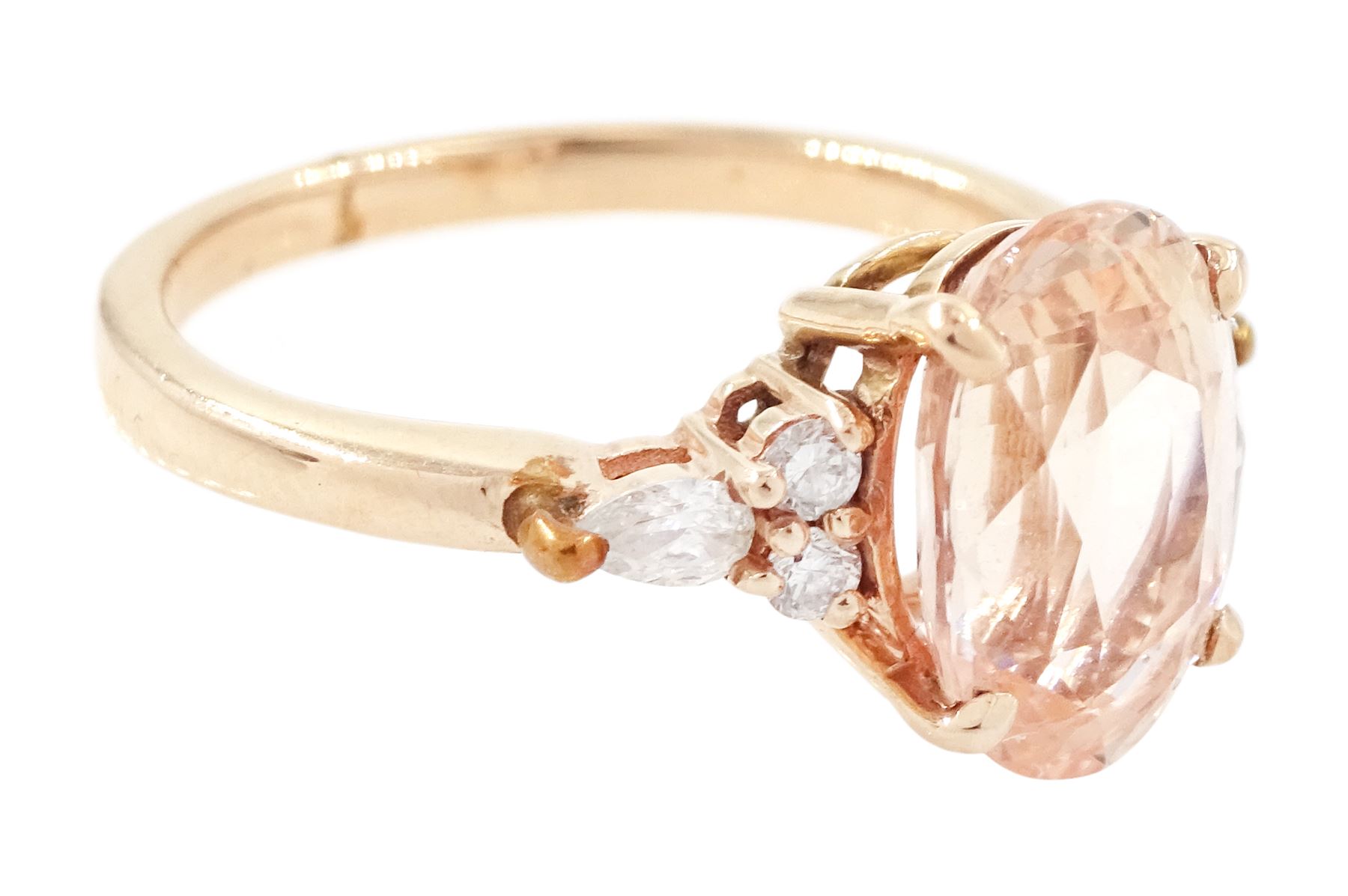 14ct rose gold pink / peach sapphire and diamond ring, single oval cut sapphire of 3.07 carat, with two round brilliant cut diamonds and a pear cut diamond set either side, stamped, total diamond weight 0.11 carat, with Gem Lab report