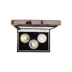 Two The London Mint Office 2009 9ct gold 1 gram half crown coins, Queen Elizabeth II Tristan Da Cunha 2014 'The World War One Centenary Silver Crown Set', The Royal Mint 2008 one ounce fine silver Britannia, United Kingdom 1986 brilliant uncirculated coin collection and other coins