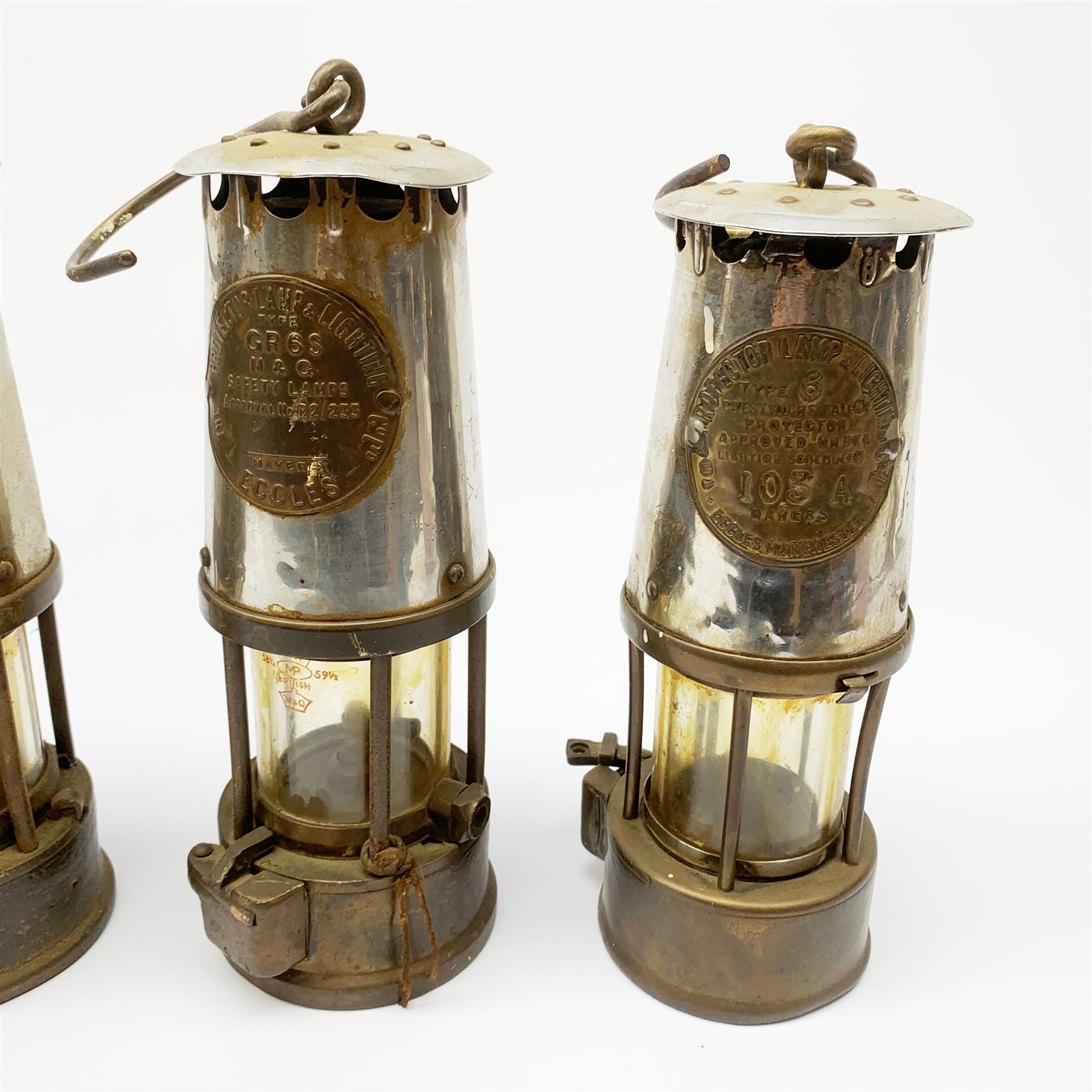 Two miners lamps, by Protector Lamp & Lighting, Eccles, together with