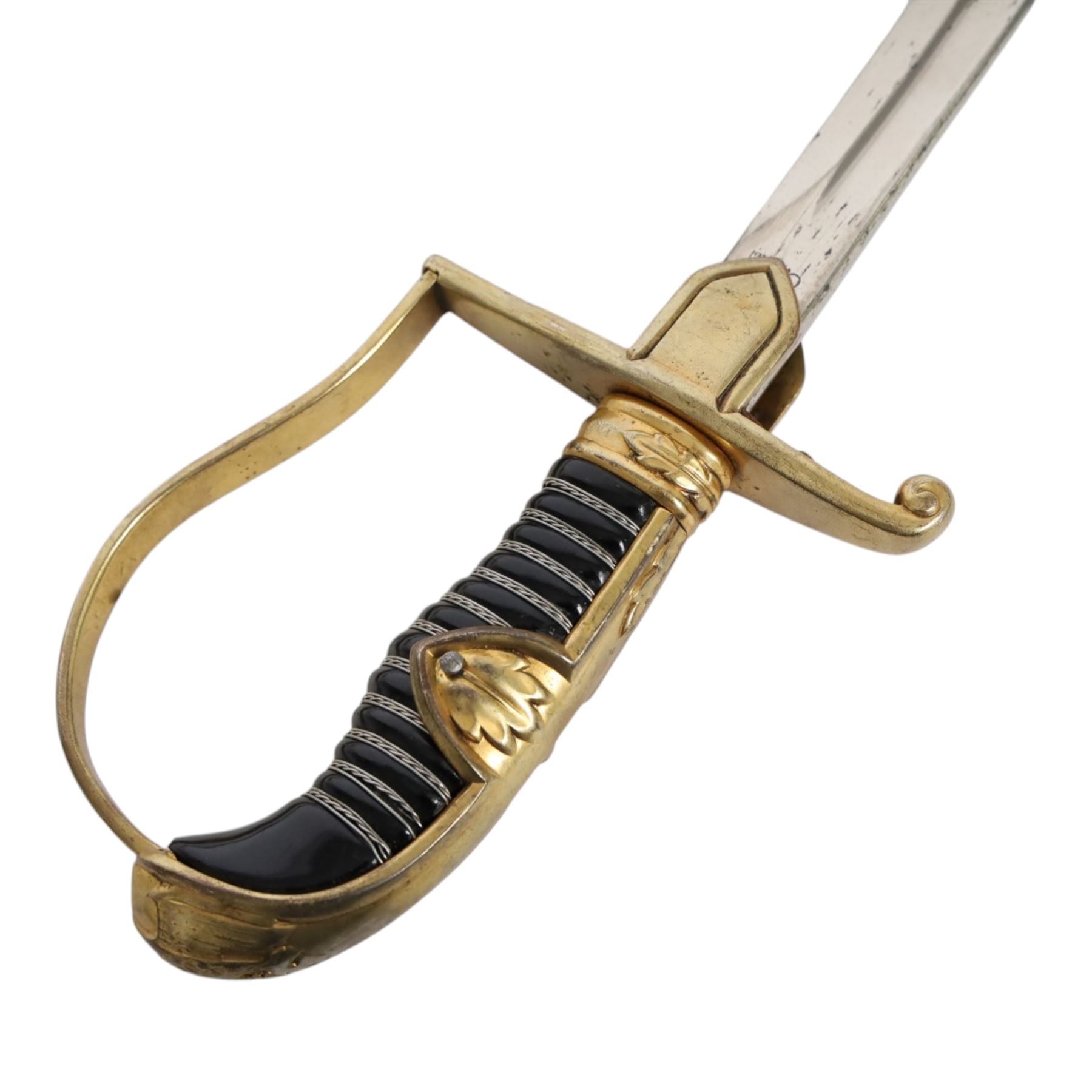 WWII German Army Prinz Eugen Pattern Officers Dress Sword by Carl Eickhorn, the 76cm slightly curving fullered blade with makers name to the ricasso, with gilt brass grip with eagle to the crossguard, guard with relief of oakleaves, Prinz Eugen style down winged eagle to the pommel of the backstrap, in original black painted scabbard with single hanging ring, overall L94cm