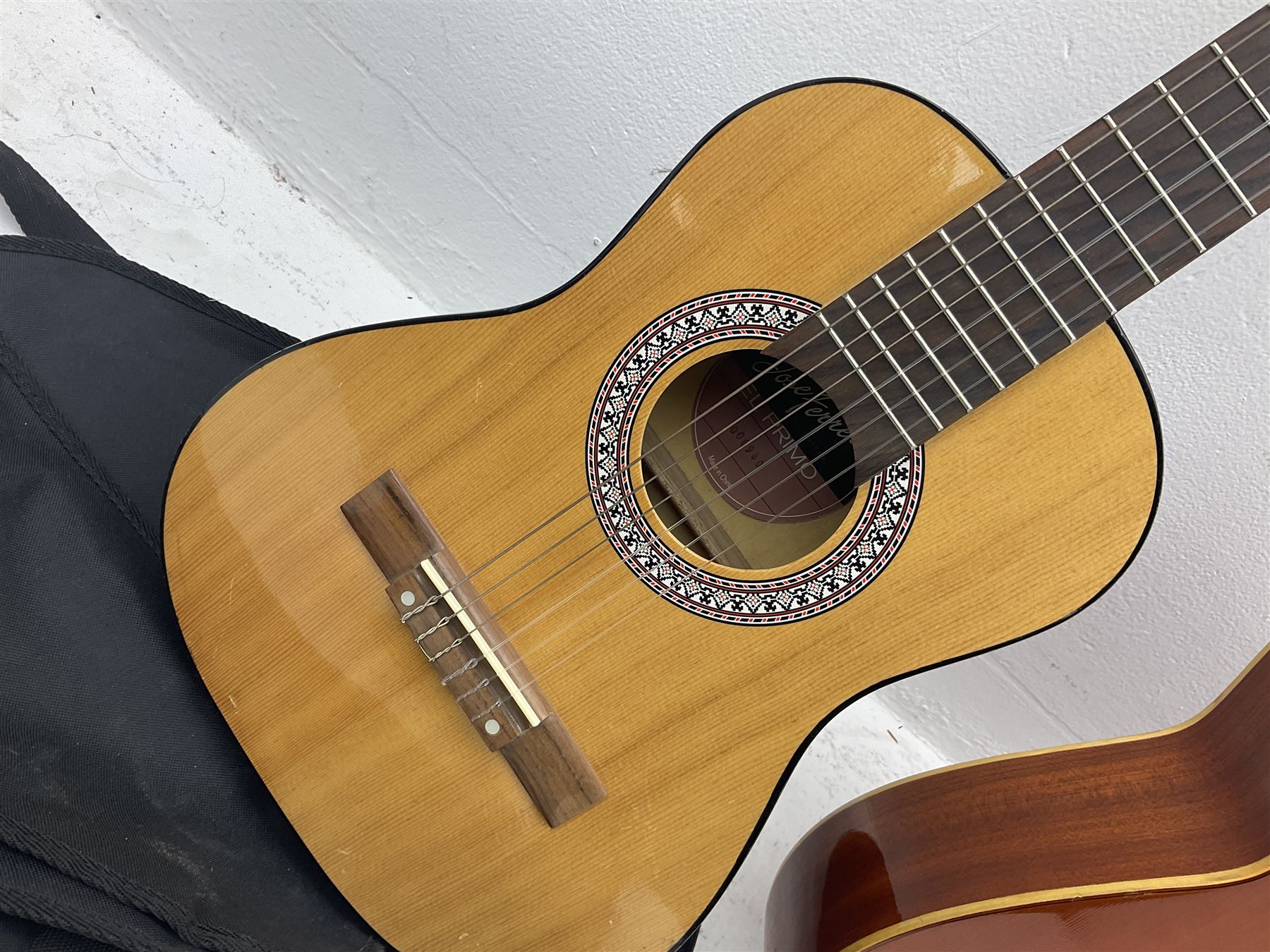 Saxon acoustic guitar Folk Model 812, serial no.43263 L102cm; Jose Ferrer El Primo small or child's size acoustic guitar, serial no.006980 L85cm; both in carrying soft cases; and Spanish Admira Concert Grande acoustic guitar (3)