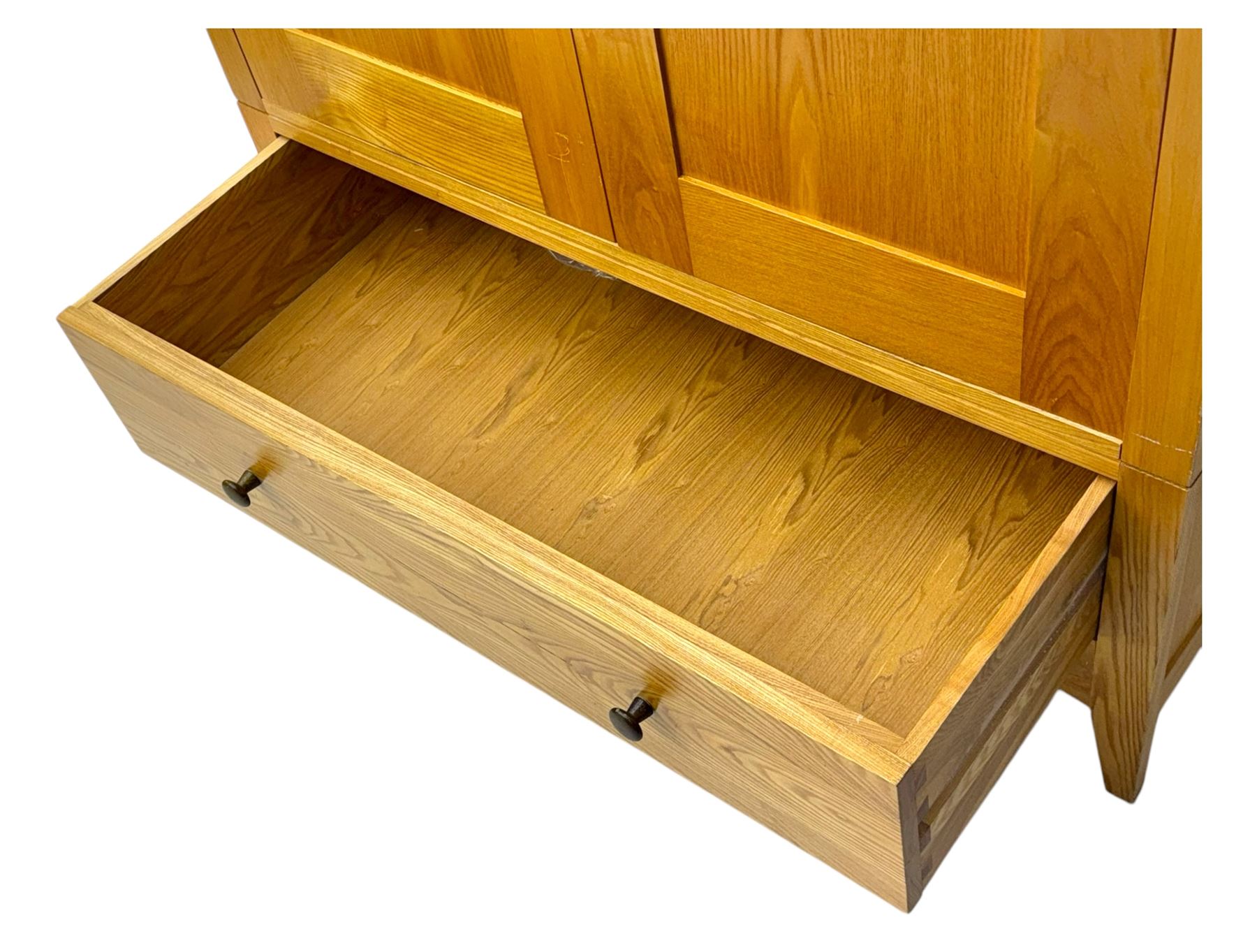 Light oak wardrobe, adjustable clothes rail and single shelf above a single drawer on squared splayed legs