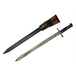 Swiss Schmidt-Rubin M1914 pioneer bayonet, with 48cm steel saw-back blade, the ricasso stamped, ''Waffenfabrik, Neuhausen'', the crosspiece stamped Swiss cross, steel scabbard, leather frog L64cm overall