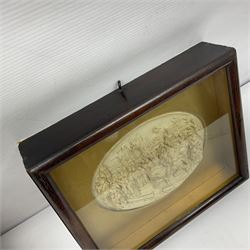 Justin Mathieu, two oval high relief plaque depicting a battle scenes, each within a wooden frame, frame  H21cm, L25cm