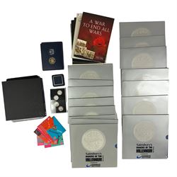 Mostly commemorative coins, medallions and fantasy coinage, including various 'Sainsbury's Makers of the Millennium' medal collection folders containing various medallions, The Toer Mint commemorative four medallion set in fitted case, Queen Elizabeth II 1982 silver proof piedfort twenty pence coin cased with certificate, various part filled The London Mint office folders etc