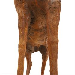 Pair of cast iron stags, upon a on moulded rocky plinth, standing alert 