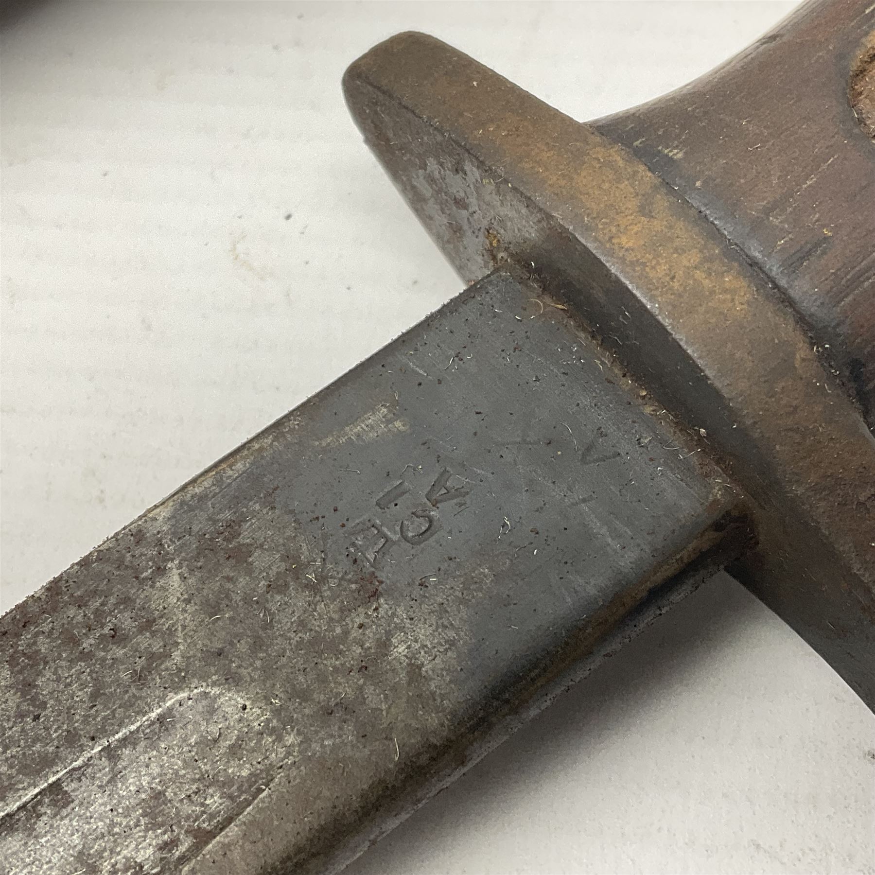 WWI Remington Pattern 1913 bayonet, the 43cm fullered blade with various marks to the ricasso including date code 11 16; in leather covered scabbard with various stamps including JWB 17 L58cm overall; and a French Model 1866 sabre bayonet (no scabbard)