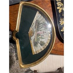 18th century fan, the horn sticks and guard with silvered and gilded decoration, the silk leaf painted in strong colours with a young couple in a garden setting, within a border of gold coloured sequins, framed and glazed, overall H35cm L55cm
Provenance: From the Estate of the late Dowager Lady St Oswald