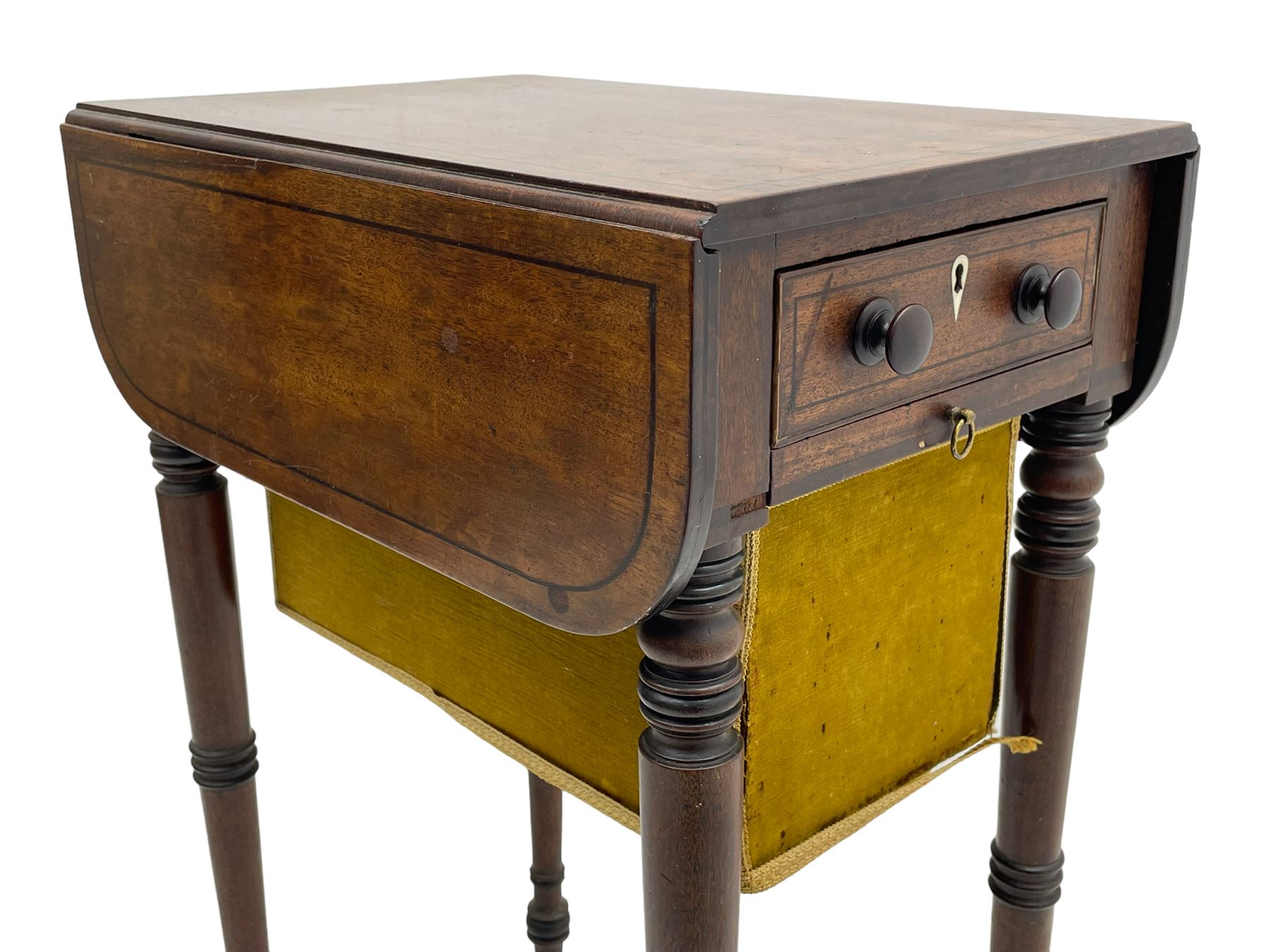 Narrow George III mahogany sewing or work Pembroke table, drop-leaf rectangular top with rounded corners inlaid with ebony stringing, fitted with single full-length cock-beaded drawer and opposing false drawer fascia, turned handles and ivory escutcheons, sliding upholstered storage bag beneath, on ring turned supports with brass cups and castors

This item has been registered for sale under Section 10 of the APHA Ivory Act