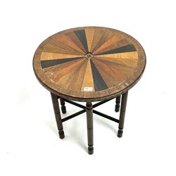 Early 20th century occasional table with circular parquetry top, segmented veneers with various woods including coromandel, maple, rosewood etc. central inlaid star, on folding base, and a barley twist stool
