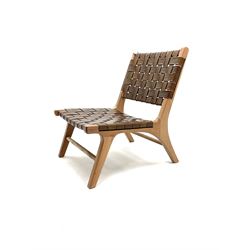 Teak lattice leather chair, shaped supports joined by stretcher 