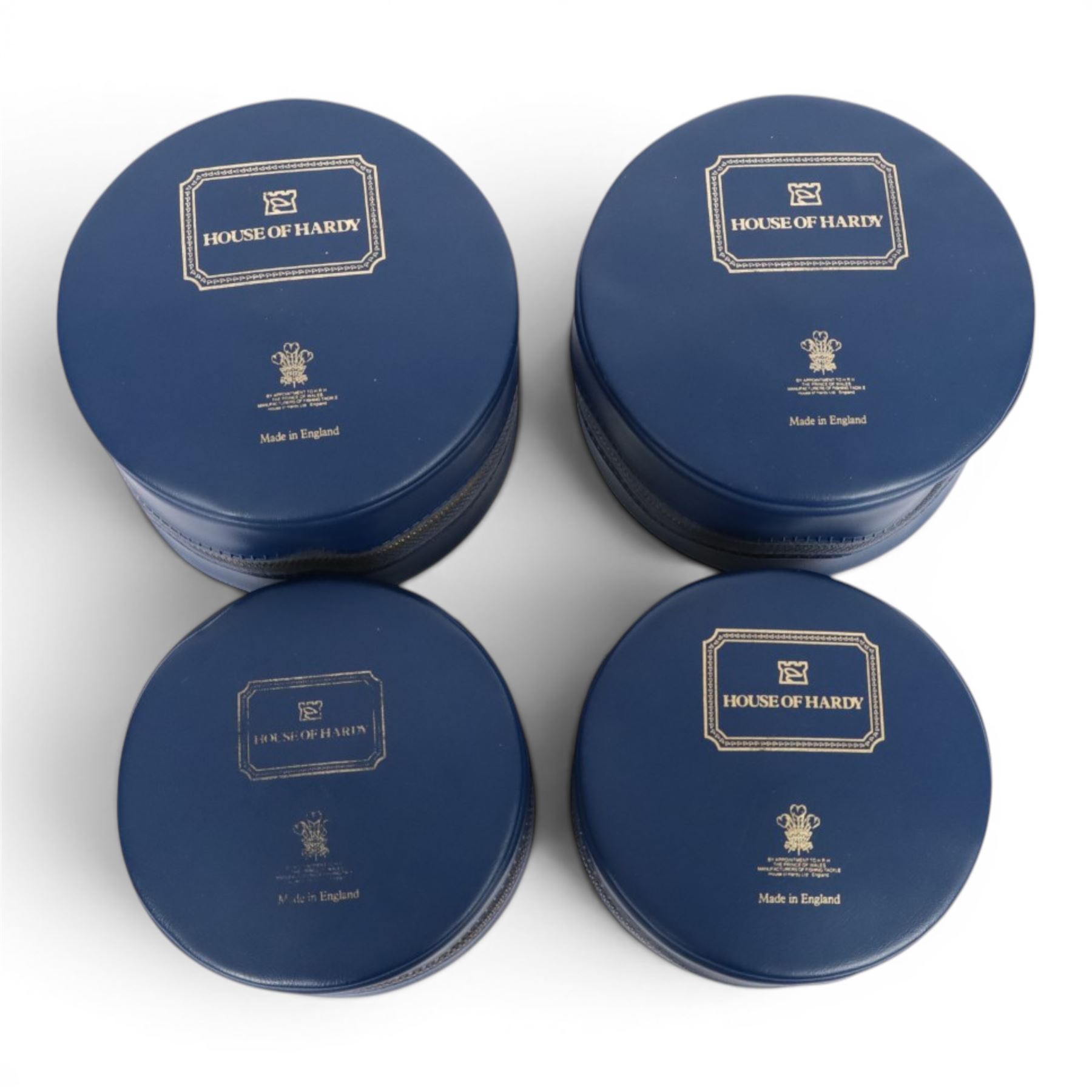 Four Hardy Bros Marquis fly fishing reels, comprising two No. 3 salmon reels, No.1 Salmon reel and a No. 10 reel, all within blue Hardy cases