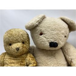 Four mid-20th century and later teddy bears including American style long bodied H71cm; large plush covered with traces of label, possibly Merrythought H75cm; and two others (4)