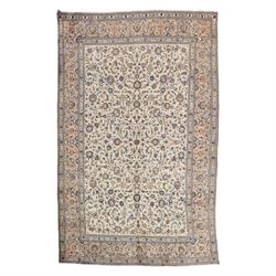 Large Central Persian Kashan hand-knotted carpet, ivory field with an all-over scrolling d...