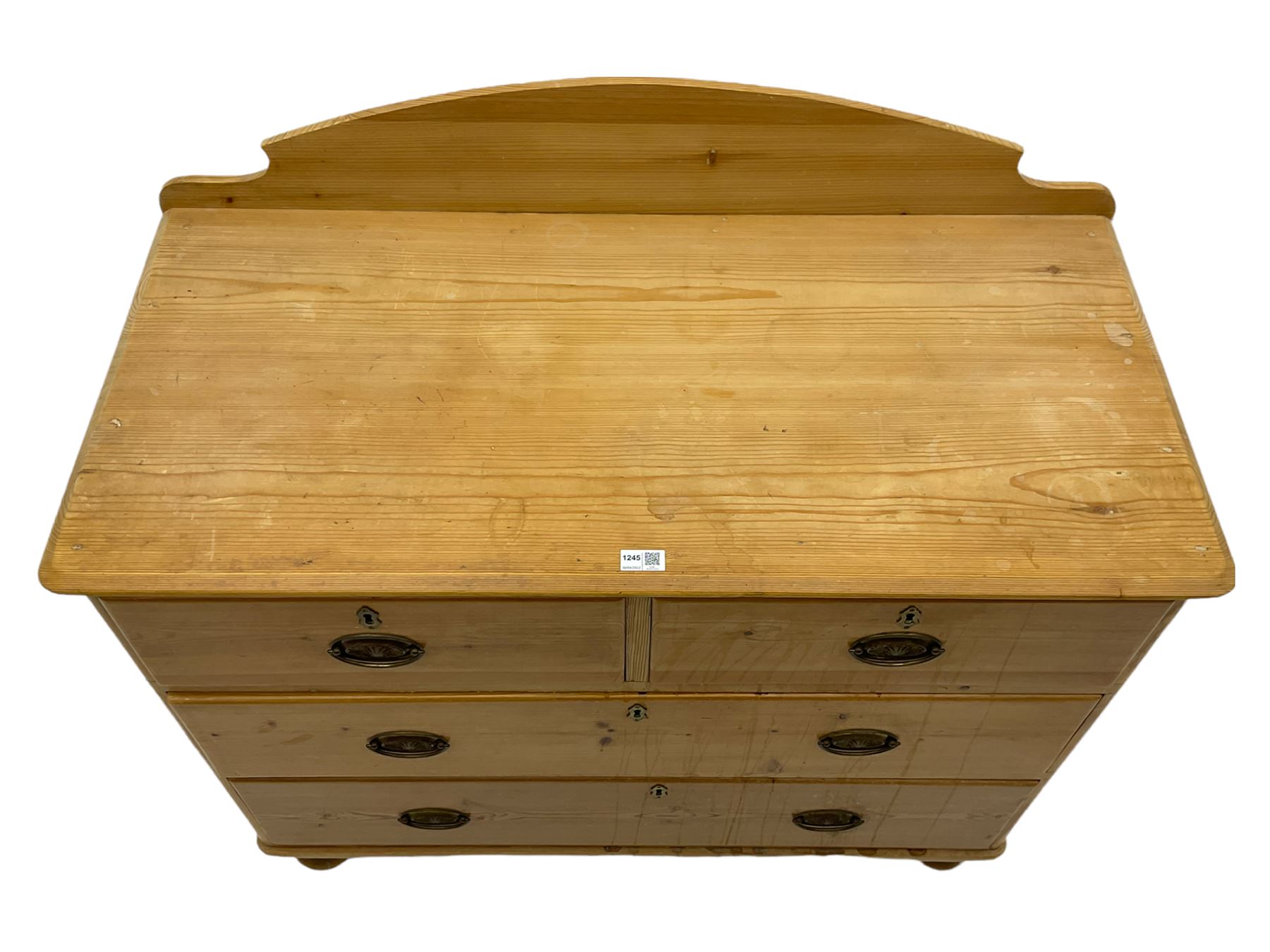 Victorian pine chest, raised shaped back, fitted with two short and two long drawers, on turned feet